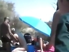 Cuckold threesome at a nude beach. spectators ? they don't give a shit !!!