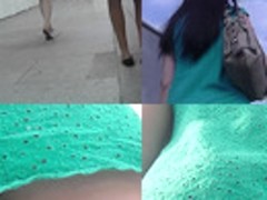 Upskirt footage of g-string of a girl in a-line skirt