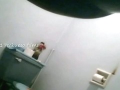 Pissing girls are filmed in the bathroom