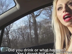 Blonde with red lips sucks cock in car
