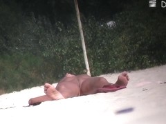 The candid tits view of pretty girls sunbathing topless