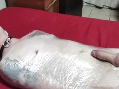 Mistress Wraps Her Slave In Clingwrap