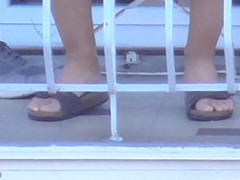 Candid Sexy Legs And Feet In Birkenstock Of A Young Brunette Woman