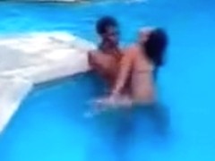 Latina girl couple fucks in the swimming pool and the shower