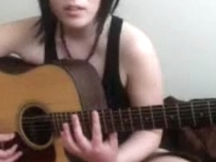 I am playing guitar in my amateur webcam clip