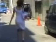 Brown haired Asian beauty skirt sharked on the street