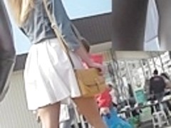 Quick peek of lengthy haired beauties upskirt