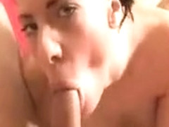 Sexy brunette babe sucks on an hard cock