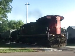 a C40-8 leads a short manifest thru Robins, IA