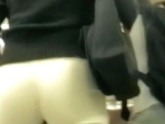 Hot blonde in tight white pants in this street cam video