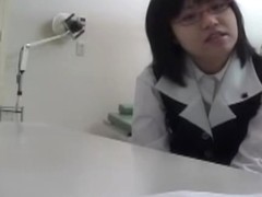 Nerdy Japanese teen got her cunt examined by a naughty gyno