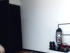 The girl AngelKiuty with a tattoo on her back masturbating