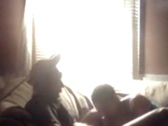 Black girl sucks andd jerks her white bf's cock on the sofa