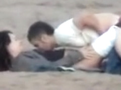 German couple makes love on the deserted beach