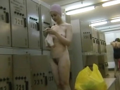 Filming her petite body in the locker room