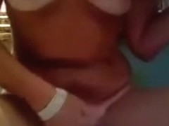 My girlfriend sits exposed in her room and rubs her soaked itchy pussy on camera