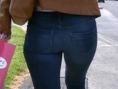 Candid ass in tight jeans tan leather jacket