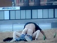 Couple having sex on the beach