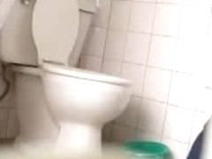 Chubby asian pissing in her bathroom voyeur candid video