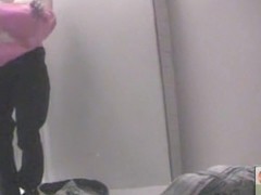 Changing room woman stays in the lingerie on camera