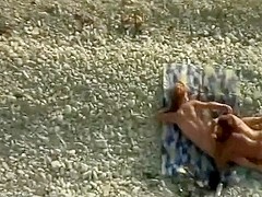 Giving head on the beach