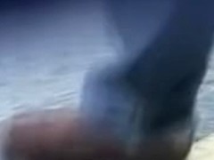 Pro skirt sharking with sticky briefcase on the crosswalk