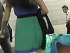 Upskirt voyeur footage of the girl in pleated skirt