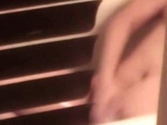 Sexy voyeur video of a hot white bitch showering