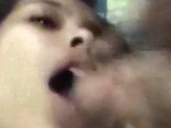 Asian girl masturbates with a vibrator, while giving her white bf a blowjob.