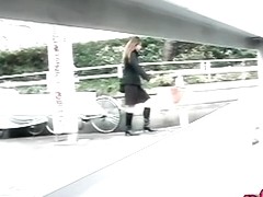 Japanese street sharking of a sexy woman in a skirt