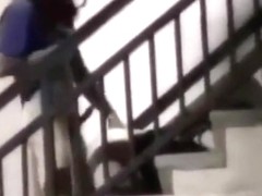 Voyeur tapes a couple having sex on public stairs outside