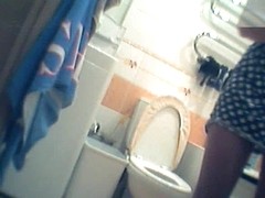 Girl in polka dot dress upskirt masturbation in toilet