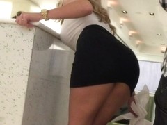 Blonde Babe with Juicy Butt in mini skirt