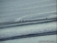 Amateur Asian teen masturbates outdoors