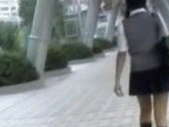 Pig-tailed oriental schoolgirl getting nicely spanked during sharking affair