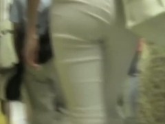 White semi-transparent pants on tight ass