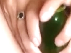 Busty chubby amateur with cucumber and bottle