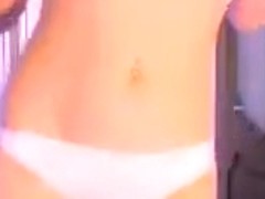 DETKAX in a short white dress