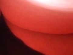 close upskirt of woman in red dress