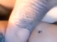Tattooed duo fuck, she rides his cock