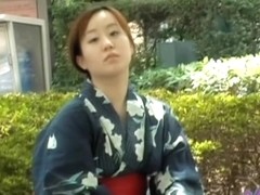 Sharking video shows a Japanese chick in a kimono in a park