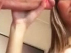 Sexy Woman sucks on cock that is massive on camera