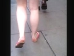 Candid girl's naked feet