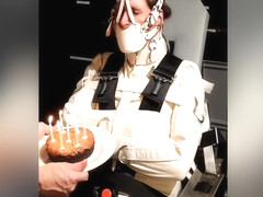 Straitjacket &amp; Muzzled Girl Tries To Blow Out Candles