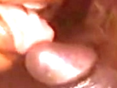 A thick ebony & a black guy get it on in a barn.