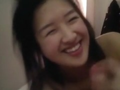 Pretty Asian girl sucking cock before work