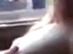 blonde girl shows her boobies in a car