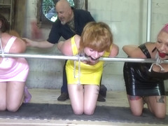 Three Germans Slaves in Shiny Dresses