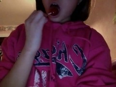 20 year old asian babe fucks herself whith a  lollipop