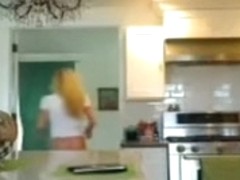 Sexy golden-haired honey in the kitchen feels slutty for boob flash